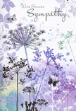 This sympathy card feels like a quiet meadow scene translated into soft watercolour, echoing the gentle character of residential streets around Grove Park. Across a background washed in muted lavender, cool indigo, and silvery green, the airy silhouettes of wild umbelliferous flowers lift their slender stems towards the top edge of the card. The flower heads are finely detailed yet delicately translucent, as though the petals have been brushed with the lightest touch of paint and then allowed to fade into the surrounding sky. Subtle gradients flow behind them, suggesting evening light diffusing through thin clouds. Between the stems, a few butterflies hover, lightly drawn with faint outlines and hints of pale blue and lilac on their wings, offering a sense of transformation, remembrance, and gentle watchfulness. The whole composition feels weightless, like a soft breath rather than a bold statement, with enough open space to let the eye rest and the heart reflect. The palette is cool but comforting, reminiscent of looking out over a quiet garden after rain has passed and the world has gone still for a moment. On such a card, a simple message of sympathy would sit naturally above the blooms, adding words to the emotion already painted in colour and line. Placed beside a vase of condolence flowers delivered to a home off Grove Park Road or near the local green, it would express support in a way that is respectful and sincere. As a florist accustomed to helping local families at difficult times, I recognise how this gentle design wraps sorrow in softness, offering solace without overwhelming the senses.